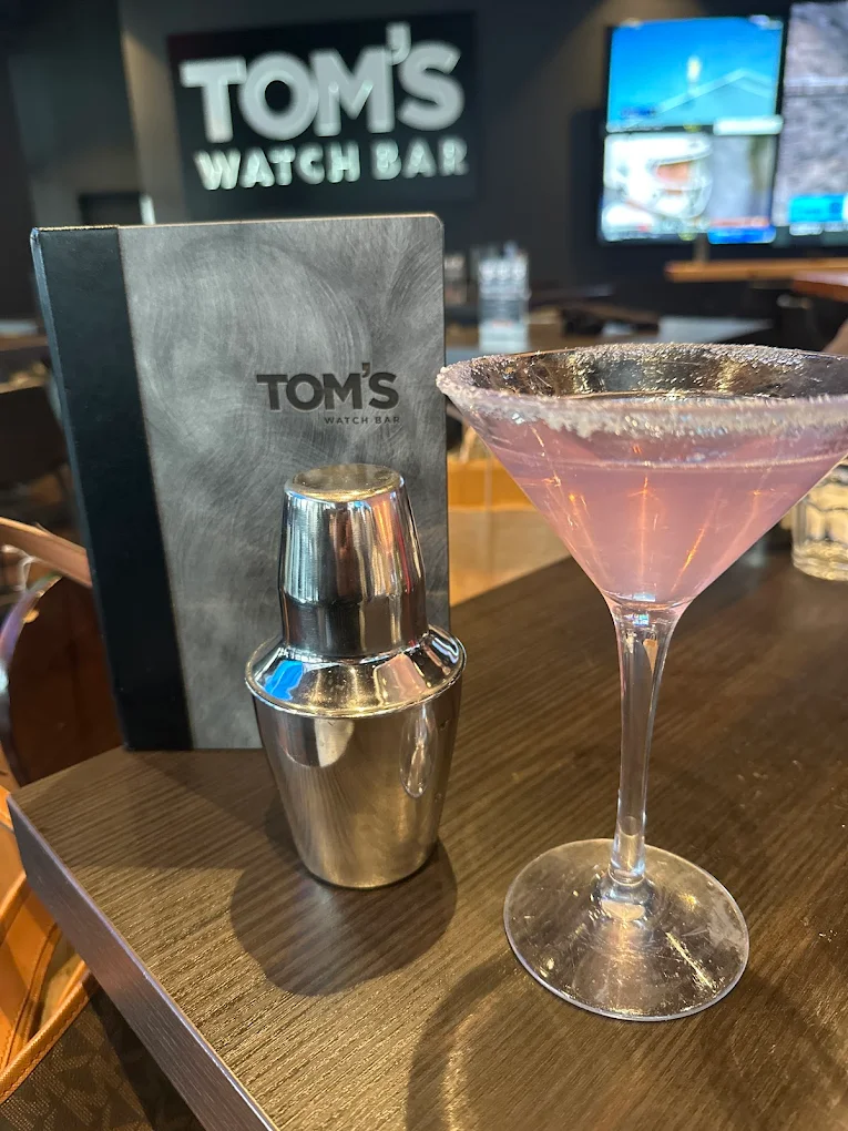 Tom's Watch Bar logo