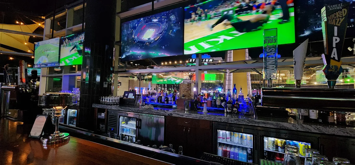 The Harp at Patriot Place logo