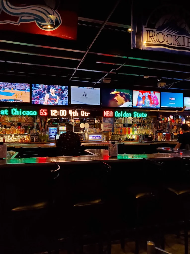 The Sportsbook Bar & Grill logo