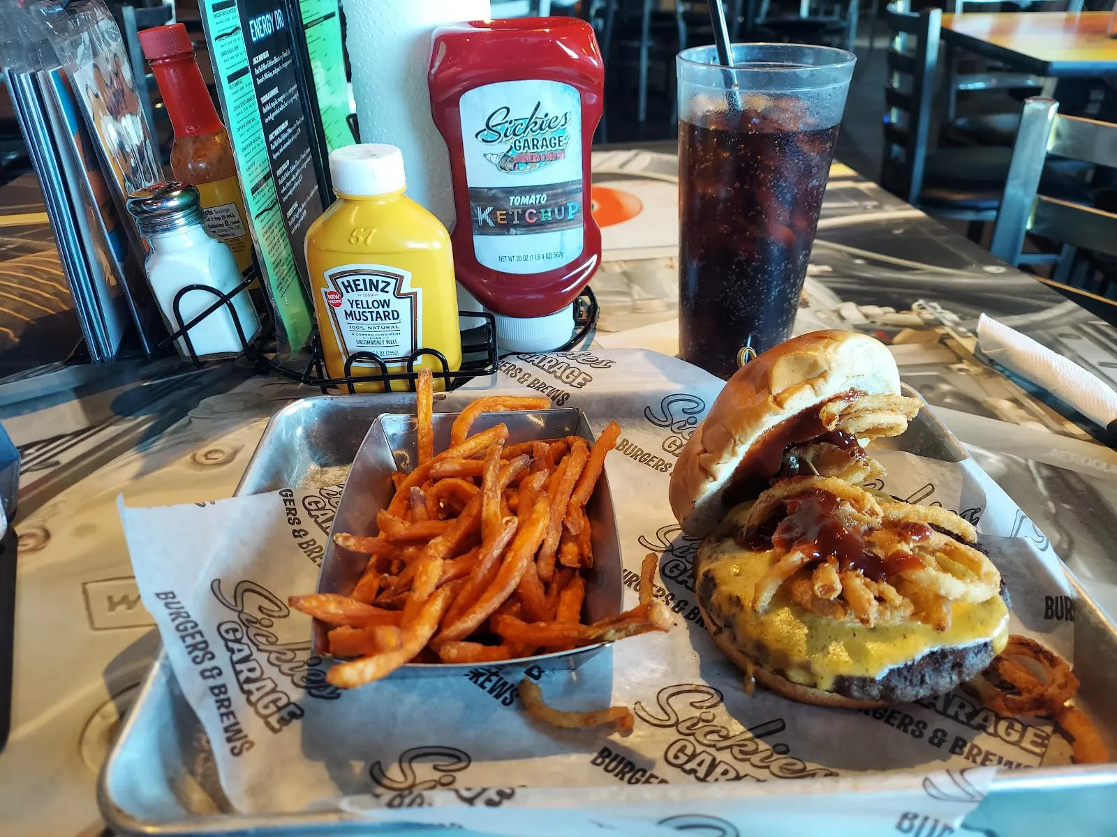 Sickies Garage Burgers & Brews logo