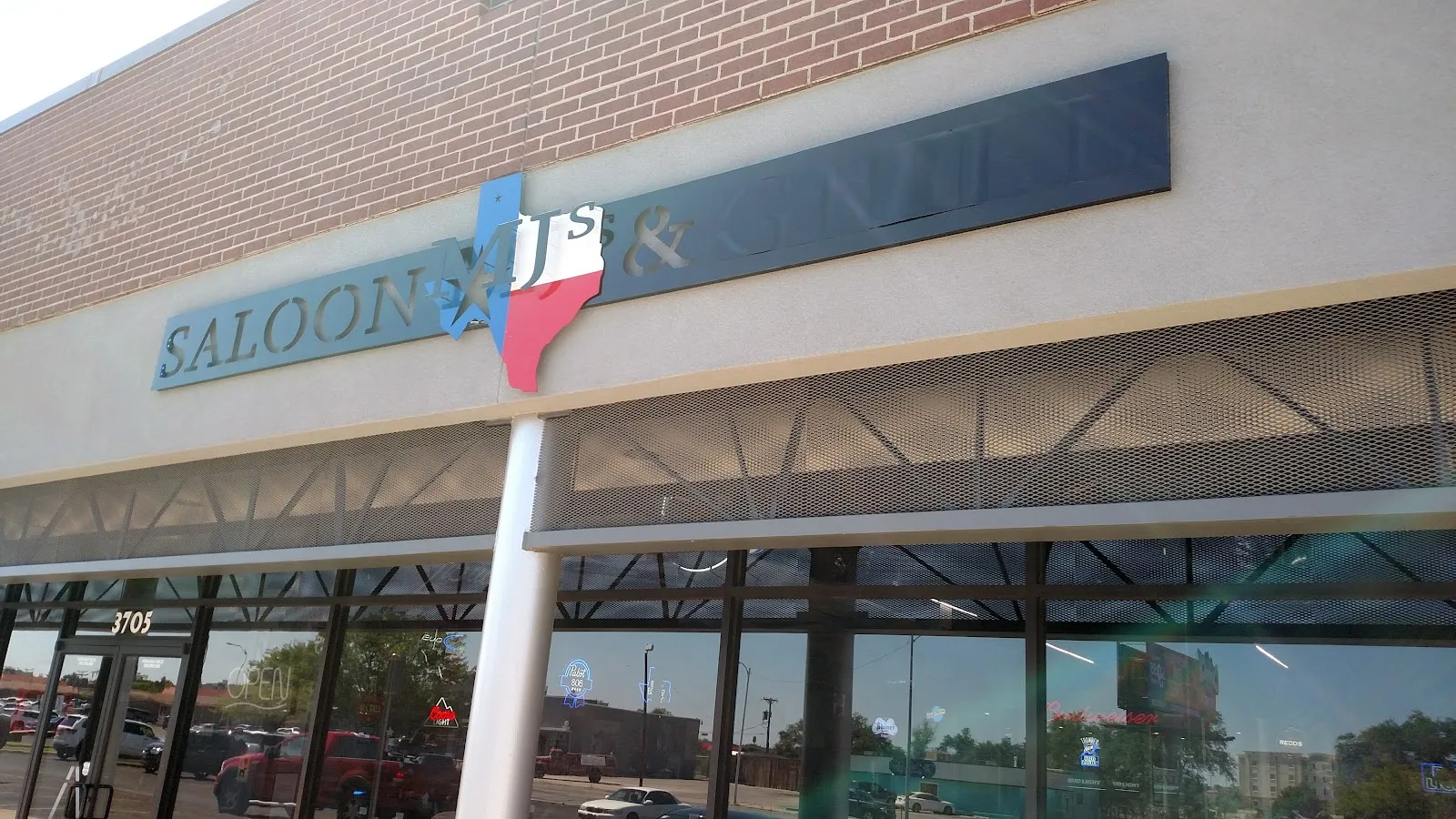 MJ's Saloon & Grill logo
