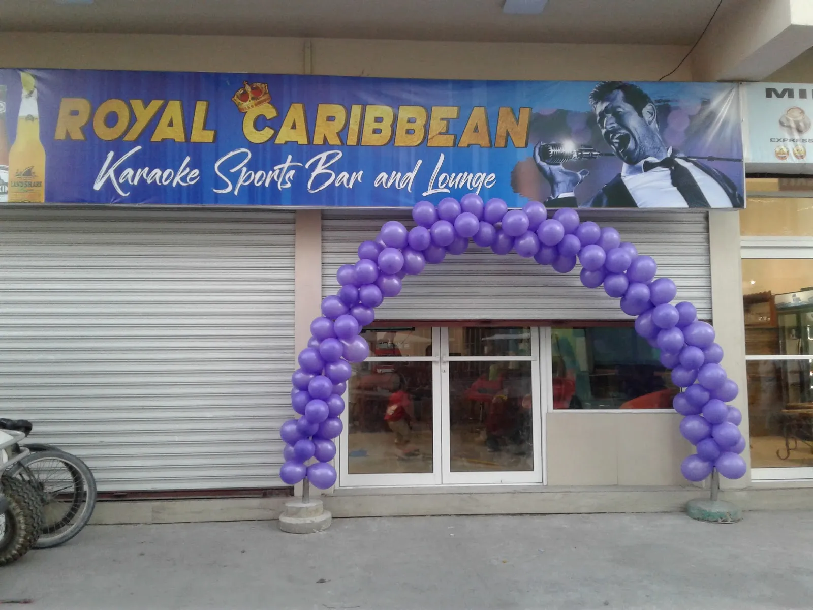 Royal Caribbean Sports Bar Karaoke lounge logo