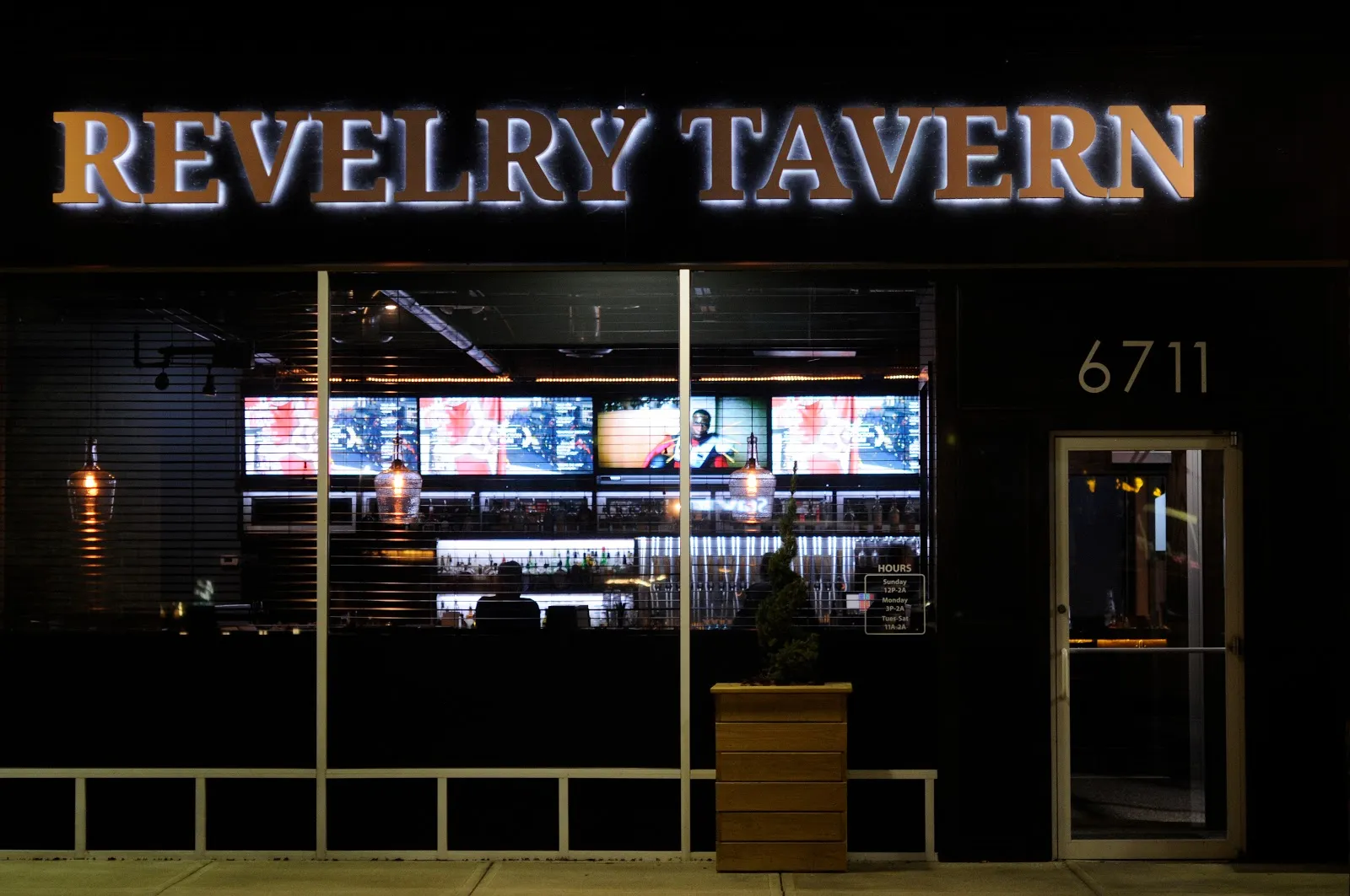 Revelry Tavern logo