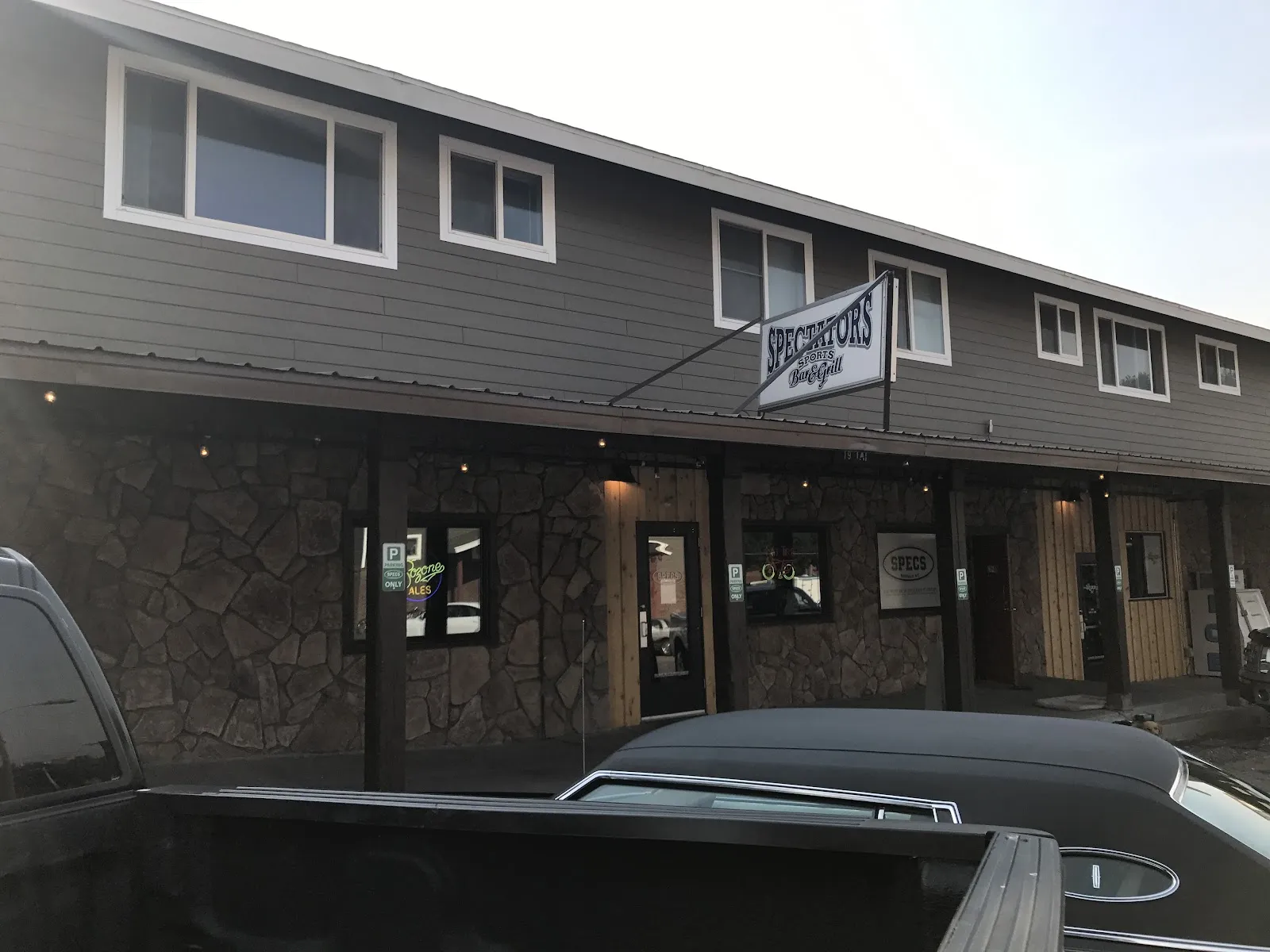 Spectators Bar and Grill logo
