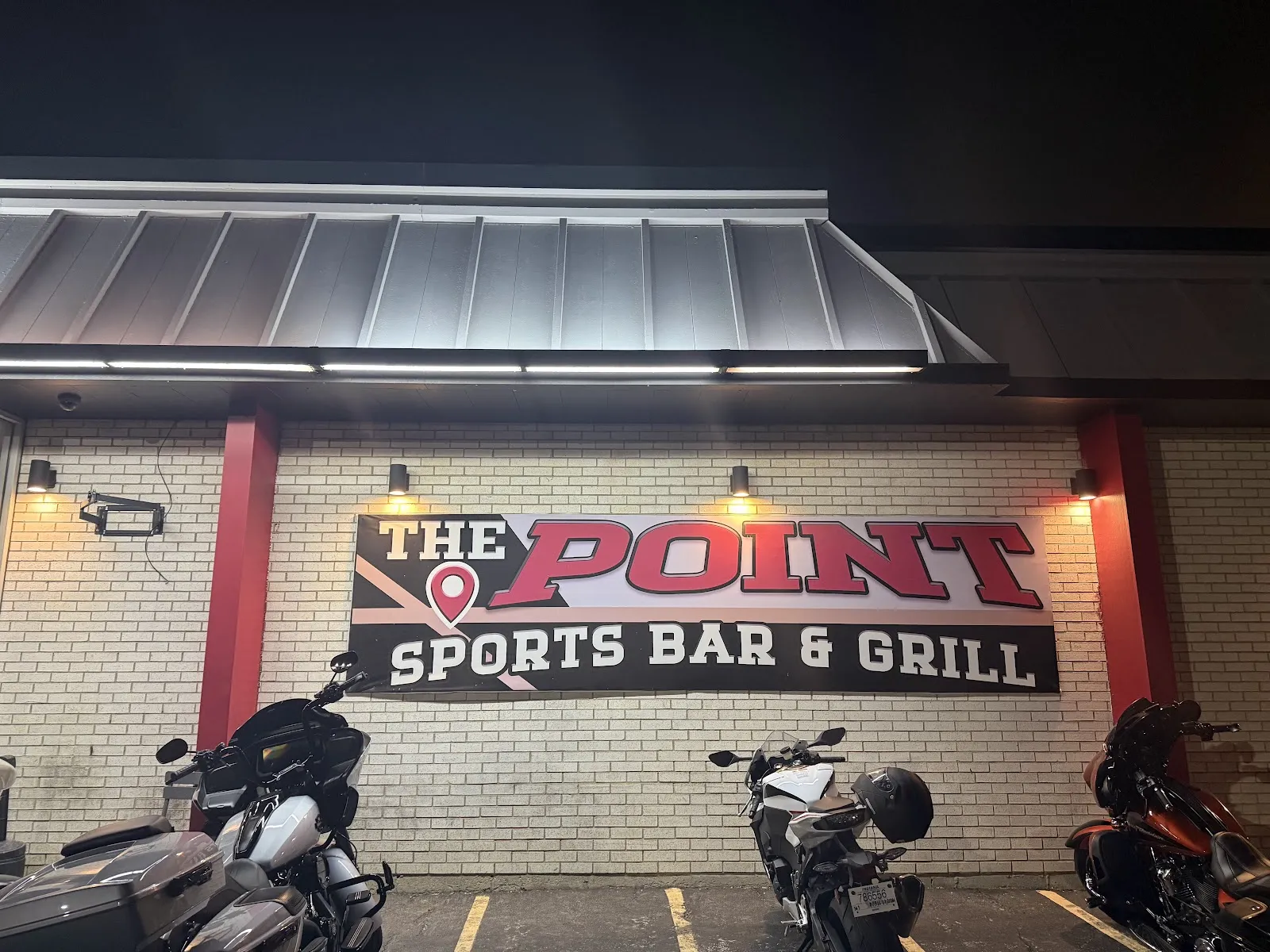 At The Office Sports Bar & Grill logo
