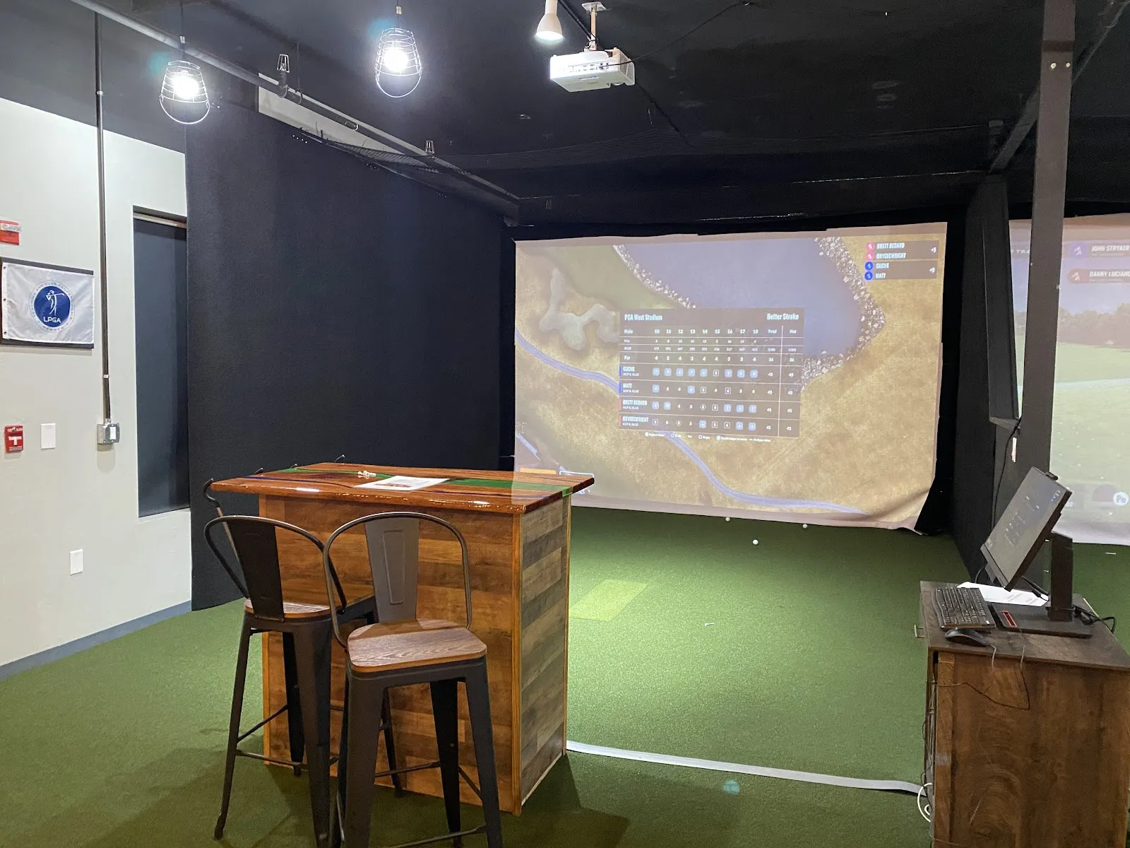 The Cave indoor golf simulators and sports bar and grill logo
