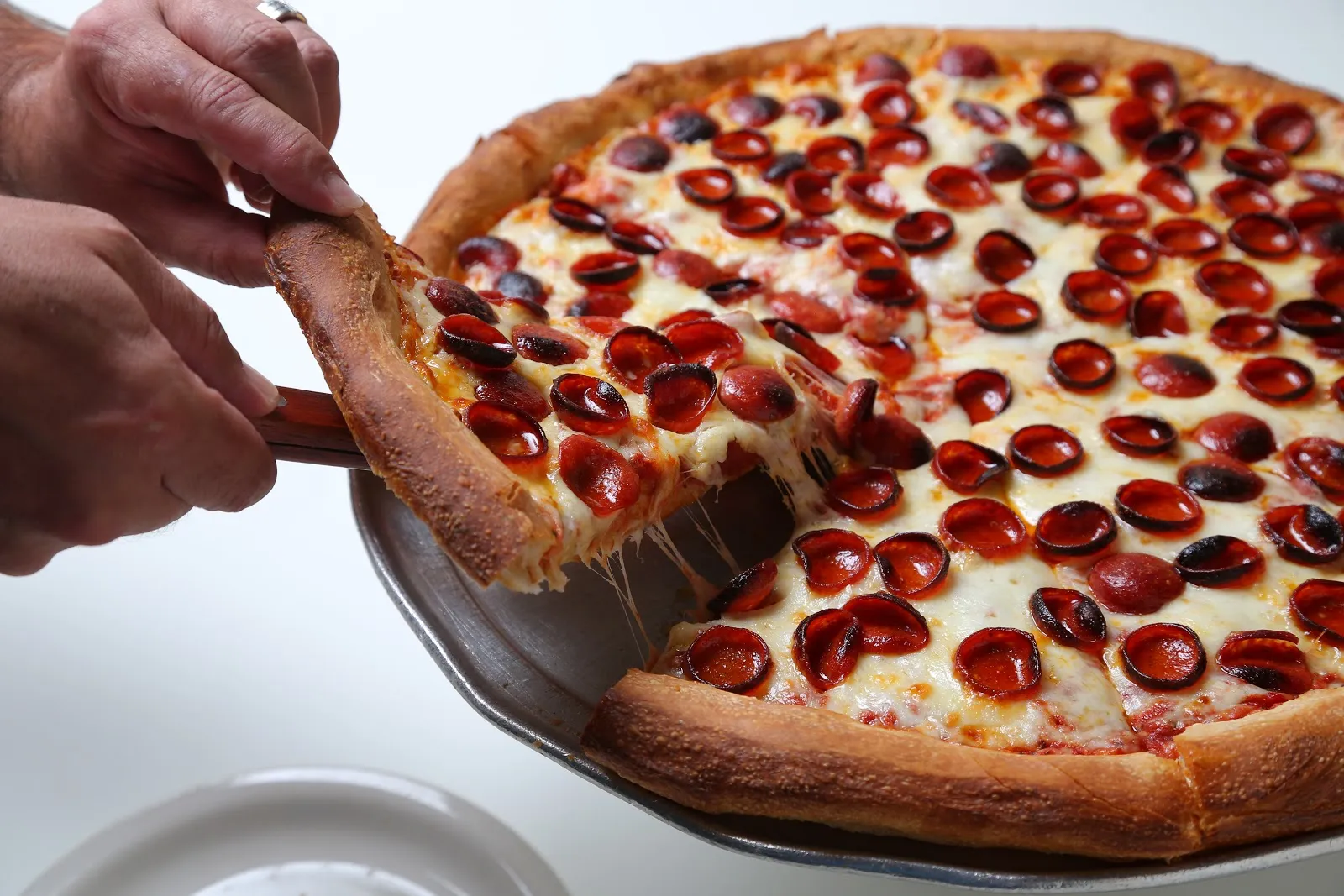 Amherst Pizza & Ale House logo
