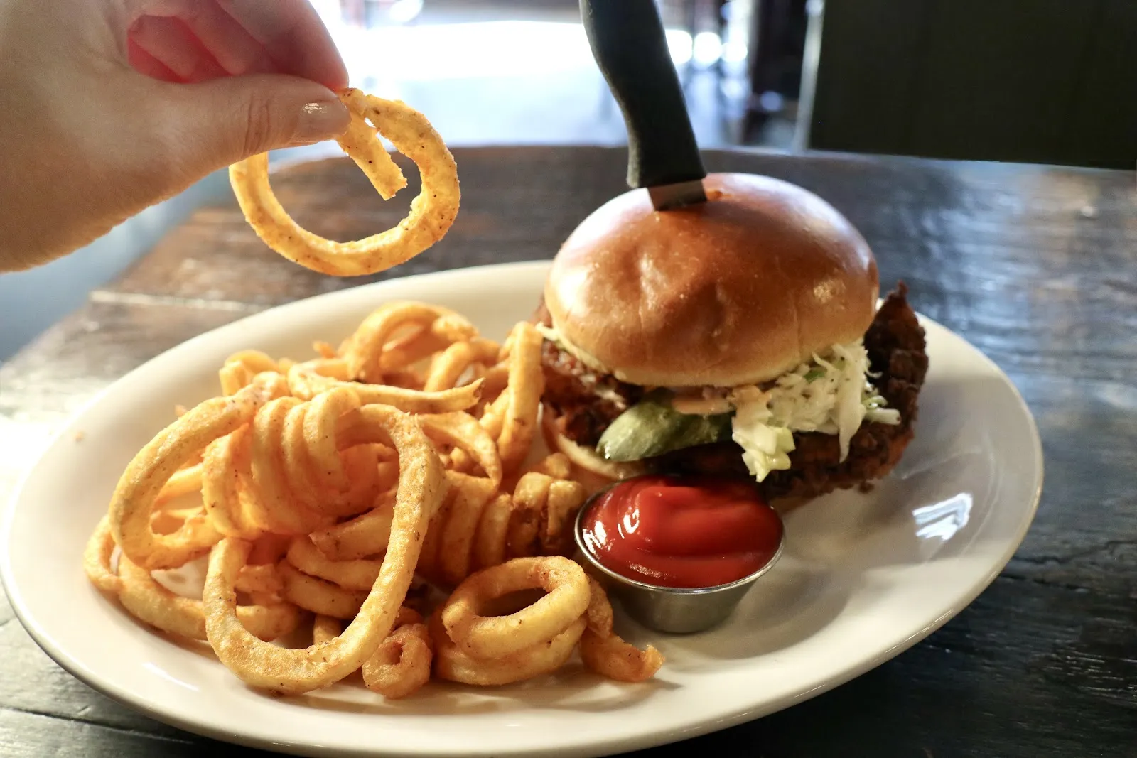 The CrossRoads Bar & Grill logo