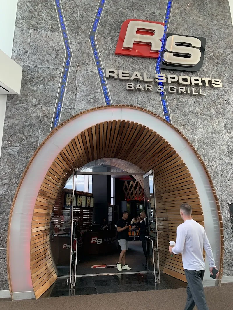 Real Sports Bar & Grill logo