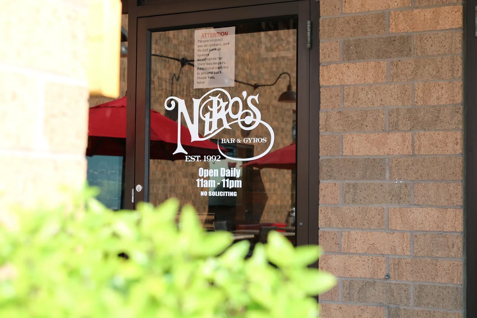 Niko's Bar and Gyros logo