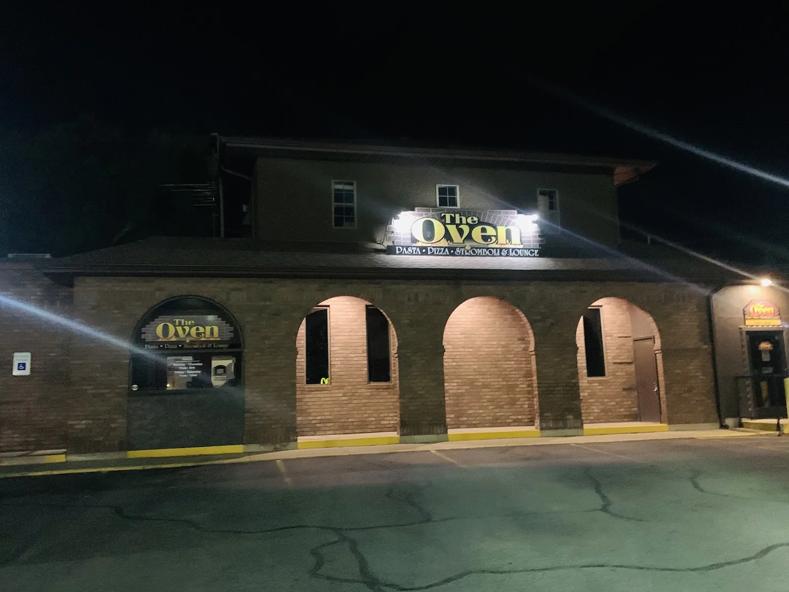 The Oven Restaurant & Lounge logo